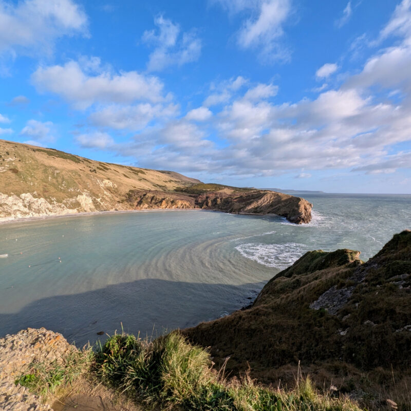 View of Lulworth Cove from the cliffs