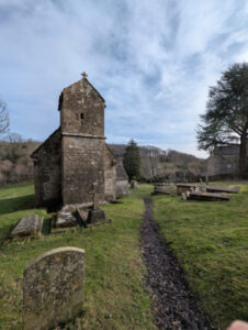 View of path through graveyard to an ancient Saxon