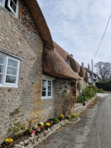 Thatched cottages on a quiet country lane