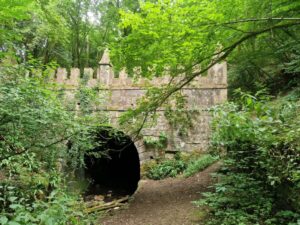 Entrance to an abandoned canal tunnel in woodland