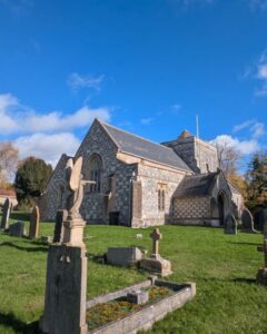 A beautiful 12th century stone church photographed from the graveyard