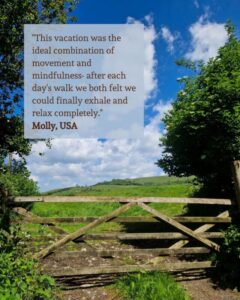 Image of a farm gate in a field with a guest quote: "This vacation was the ideal combination of movement and mindfulness. After each day's walk we both felt we could finally exhale and relax completely."