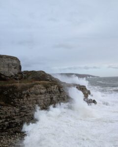 Waves crashing on the Dorset coast in winter