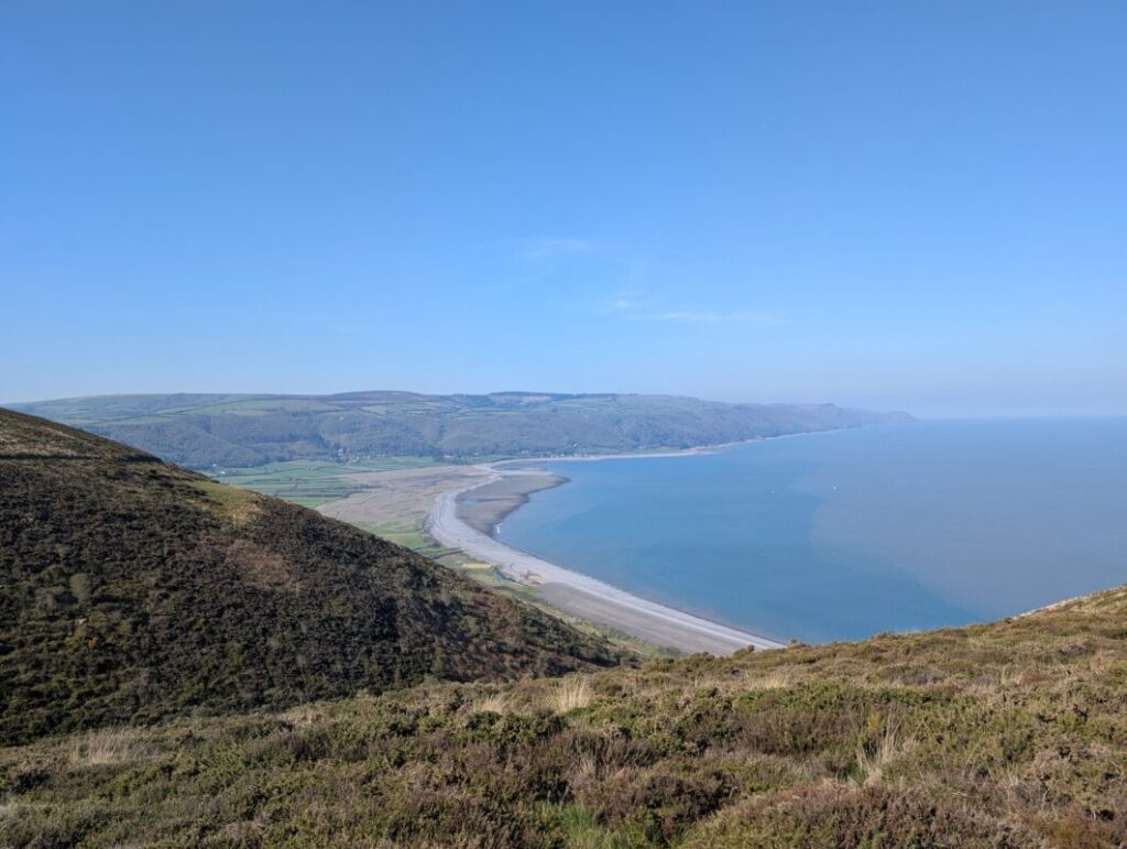 View of the Exmoor coast from the top of coastal cliffs.
