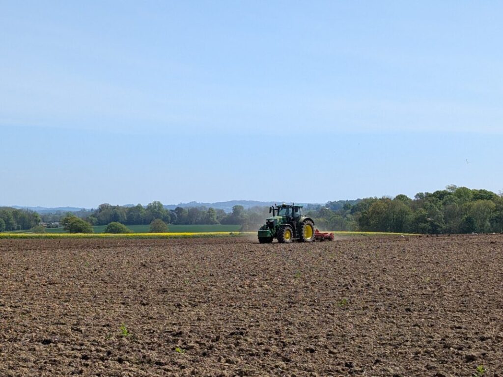A tractor ploughing a field
