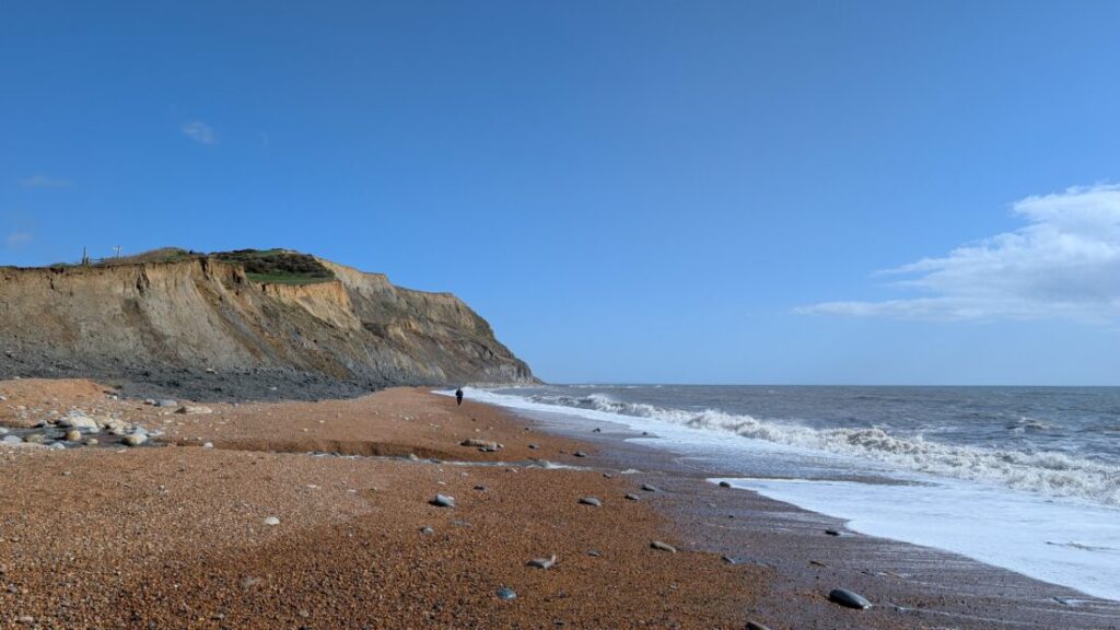 View of Golden Cap cliff on the Dorset coast from the beach below