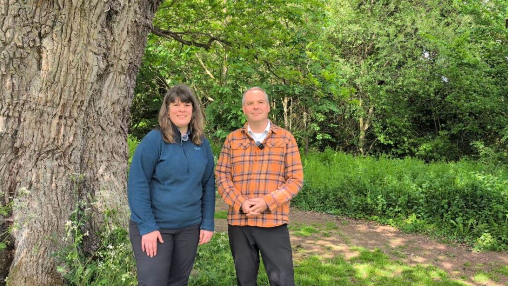 Foot Trails Founders Alison and David Howell standing in front of an old oak tree