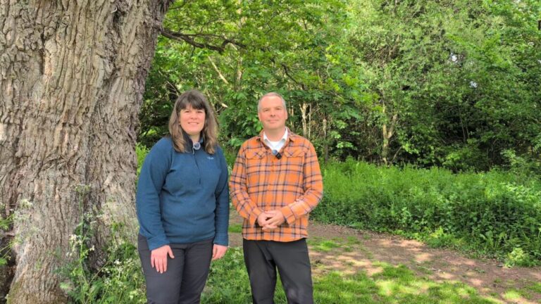 Foot Trails Founders Alison and David Howell standing in front of an old oak tree