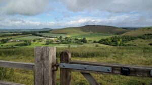 View of the Cranborne Chase hills with a wooden gate in the foreground