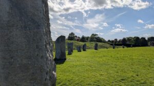 View of a megalithic stone circle with the individual stones arcing off into the distance.